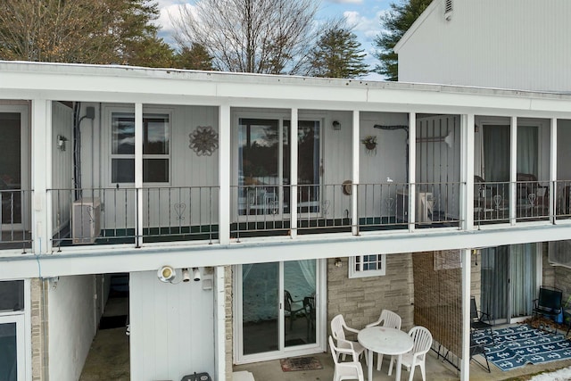 rear view of property with a patio area