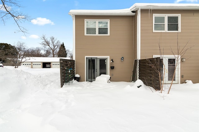 view of snow covered house