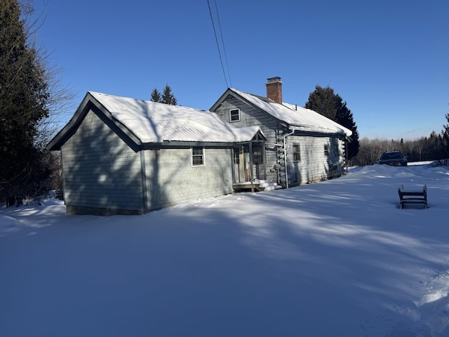 view of snow covered property