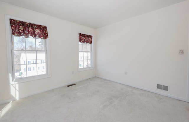 view of carpeted spare room