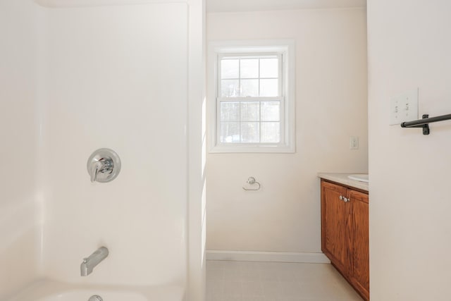 bathroom with vanity and shower / bath combination