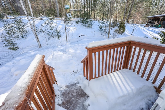 view of snow covered deck