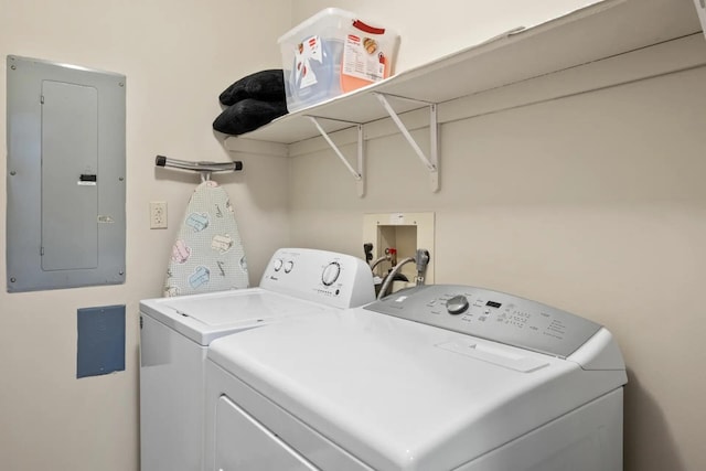 laundry area featuring independent washer and dryer and electric panel