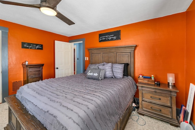 bedroom with light carpet and ceiling fan