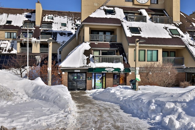 view of snow covered building