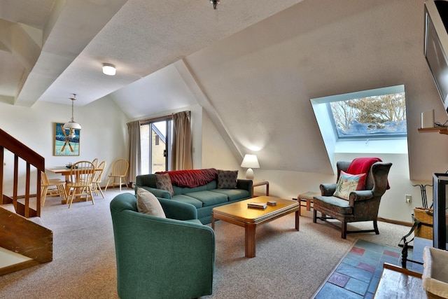 carpeted living room featuring vaulted ceiling