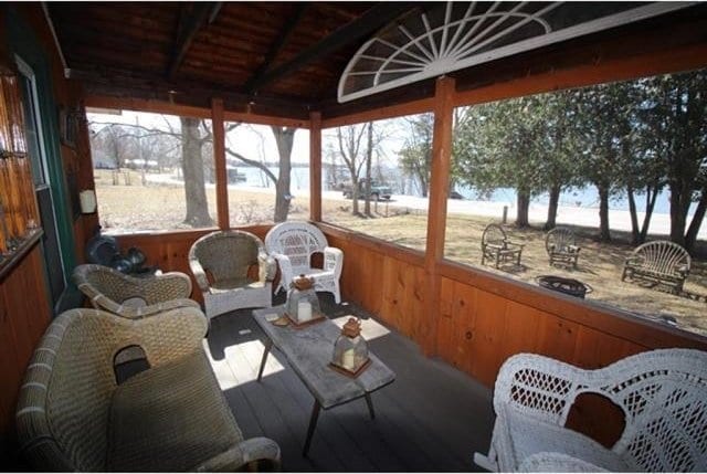 sunroom / solarium with wooden ceiling