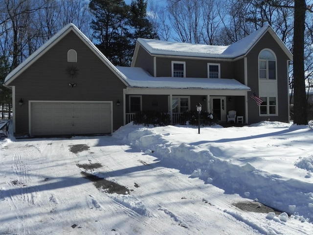 view of front of property featuring covered porch and an attached garage