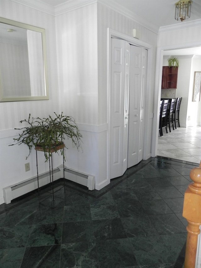 hallway featuring ornamental molding and a baseboard radiator