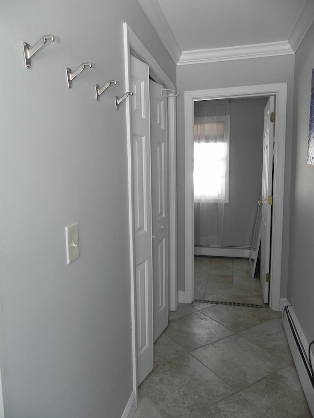 hall featuring crown molding and a baseboard heating unit