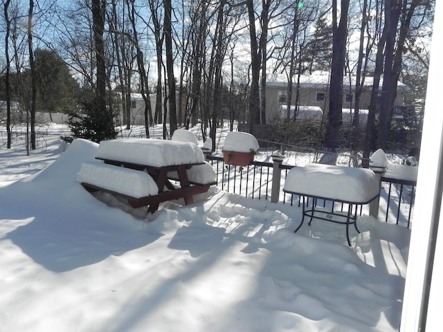 view of snow covered deck