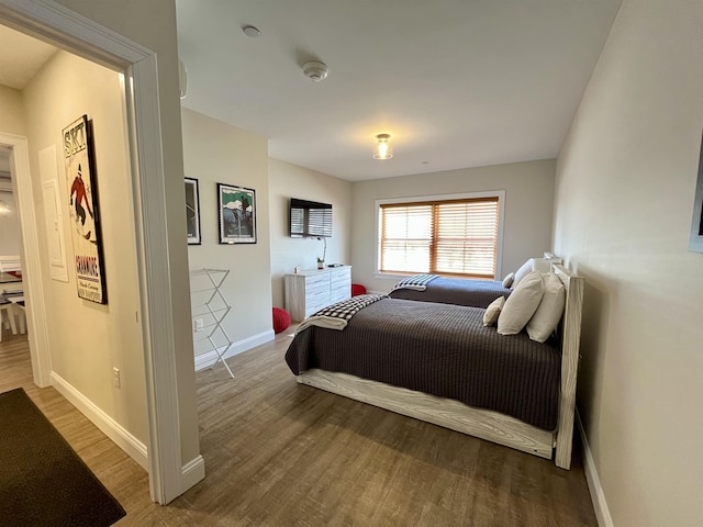 bedroom featuring hardwood / wood-style floors