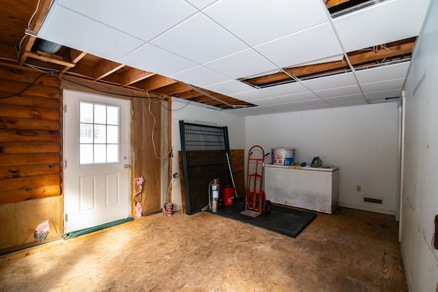 basement with a drop ceiling