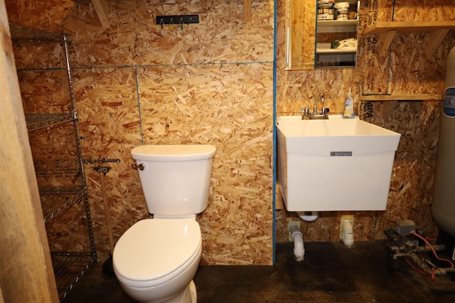 bathroom featuring sink and toilet