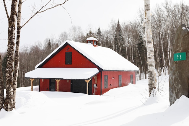 view of snow covered garage