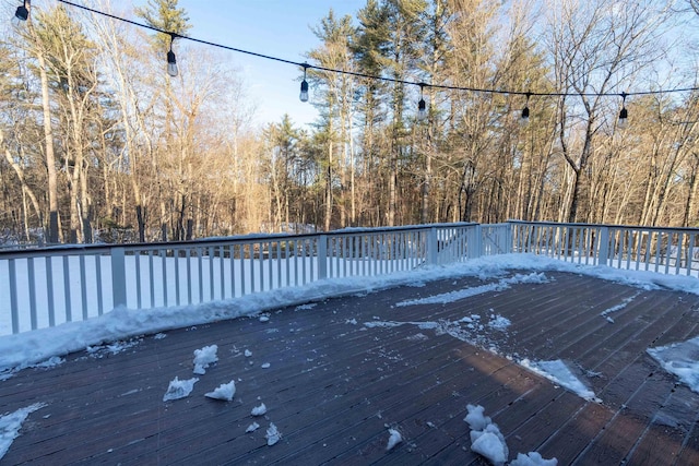 view of snow covered deck