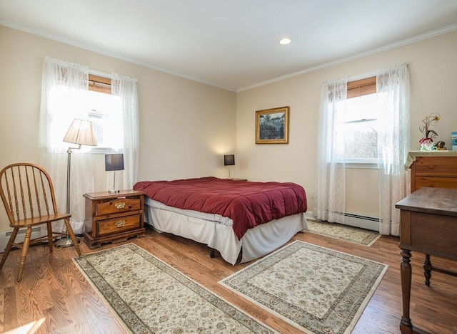 2400 Upper Cold River Rd, Shrewsbury, VT 05738 - bedroom featuring baseboard heating, crown molding, and wood-type flooring