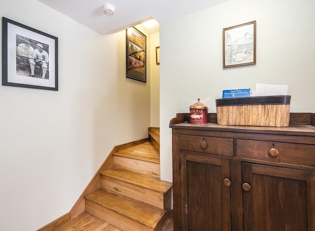 2400 Upper Cold River Rd, Shrewsbury, VT 05738 - staircase featuring hardwood / wood-style flooring