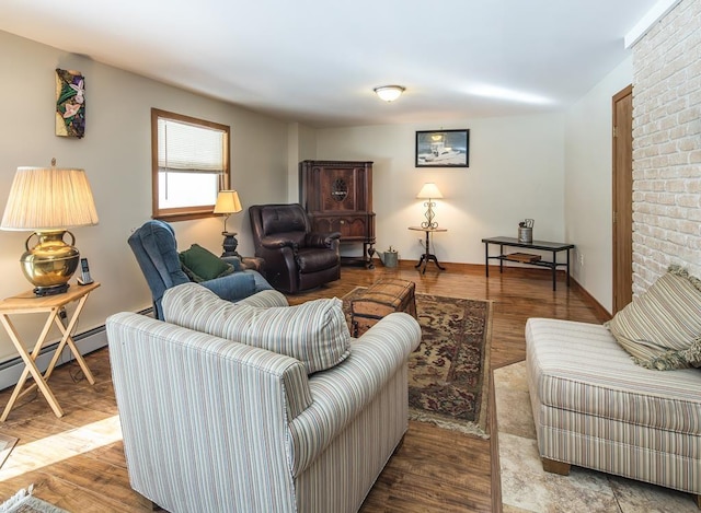 2400 Upper Cold River Rd, Shrewsbury, VT 05738 - living room featuring baseboard heating and light hardwood / wood-style flooring
