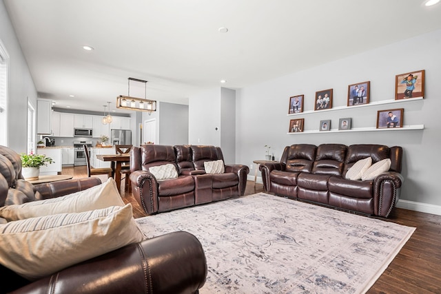 living room with dark wood-type flooring