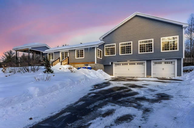 view of front of property featuring a garage