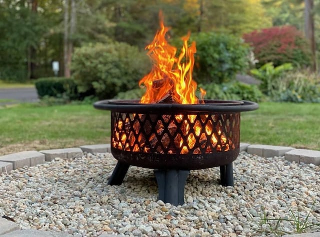 exterior details with a fire pit