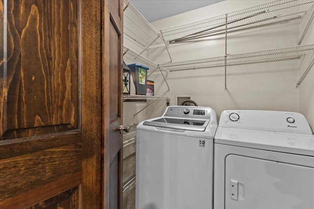 laundry area with washer and dryer