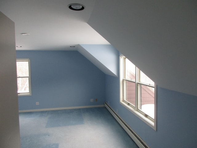 bonus room featuring carpet flooring and lofted ceiling