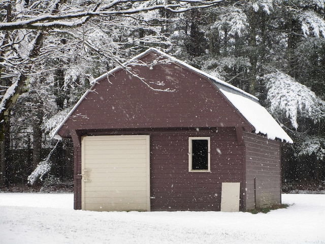 view of snow covered garage