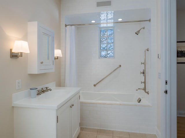 bathroom with shower / bath combo and vanity