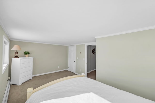 carpeted bedroom with crown molding and baseboard heating