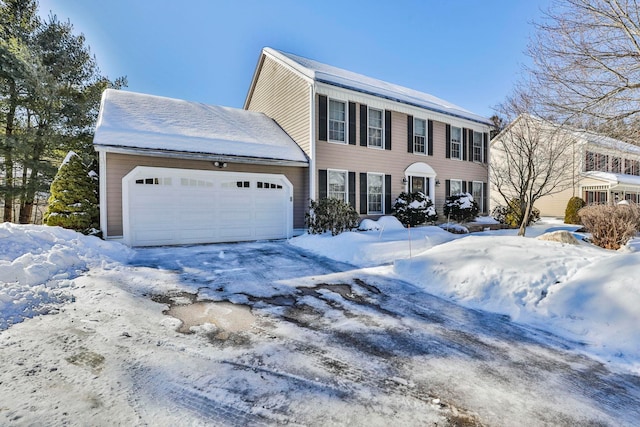 colonial inspired home with a garage