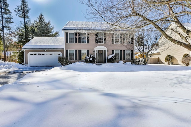 colonial home featuring a garage