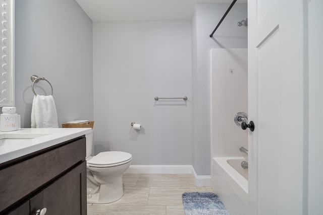 full bathroom with bathtub / shower combination, toilet, and vanity