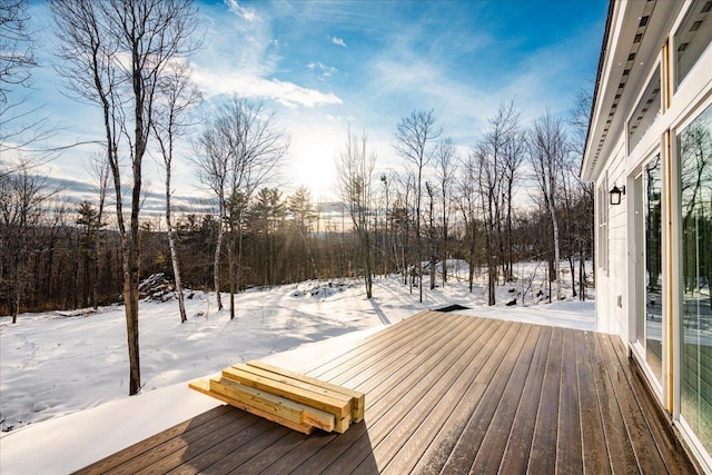 view of snow covered deck