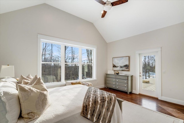 bedroom featuring vaulted ceiling, dark hardwood / wood-style floors, and ceiling fan