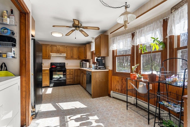 kitchen featuring a baseboard radiator, black appliances, ceiling fan, decorative backsplash, and washer / clothes dryer