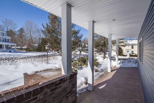 view of snow covered patio