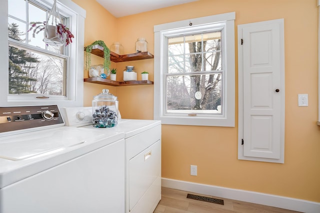 laundry area featuring separate washer and dryer