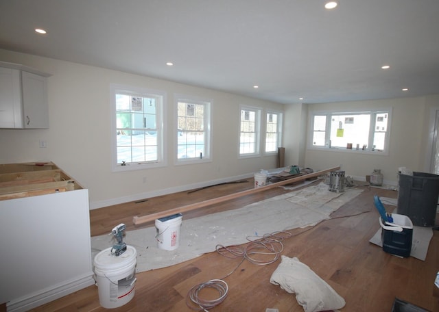 living room featuring recessed lighting and wood finished floors