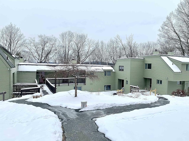 view of snow covered property