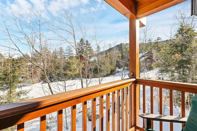 view of snow covered deck