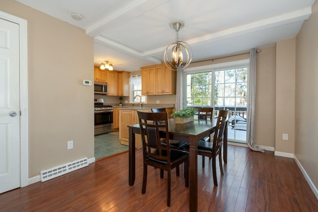 dining space featuring baseboards, beam ceiling, visible vents, and dark wood-style flooring