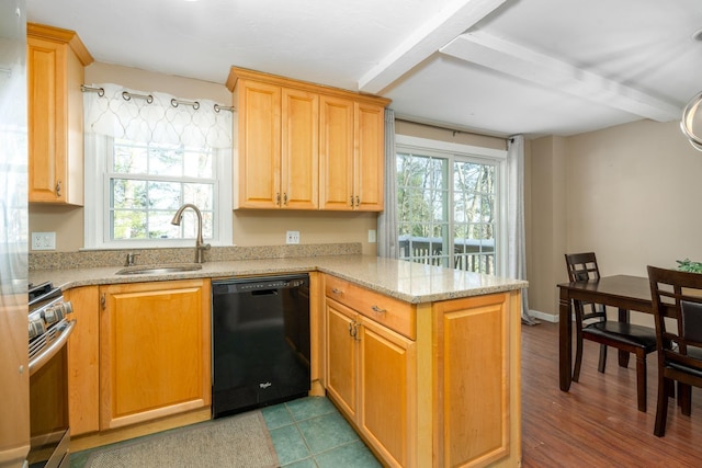 kitchen featuring black dishwasher, a sink, a peninsula, light stone counters, and stainless steel range