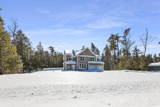 view of snow covered property