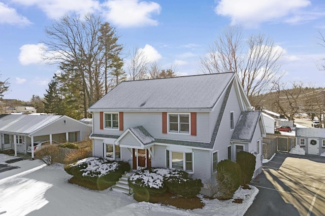 traditional-style home featuring a garage