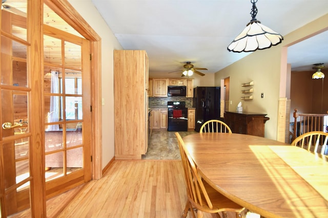 dining area with light wood-style floors, baseboards, and a ceiling fan