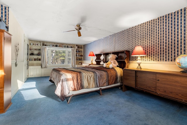 bedroom featuring carpet floors, wallpapered walls, and a ceiling fan