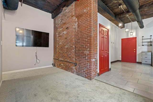 interior space featuring light carpet, wooden ceiling, and beamed ceiling