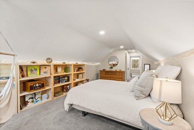 carpeted bedroom with lofted ceiling and recessed lighting